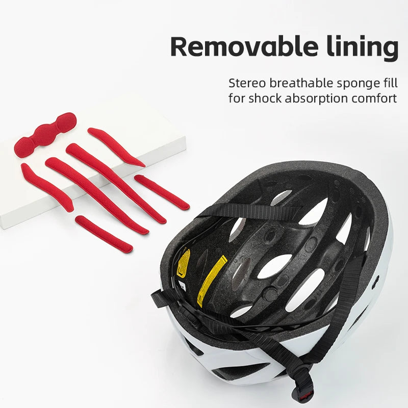Black and white helmet with red straps and text about removable lining and shock absorption comfort.